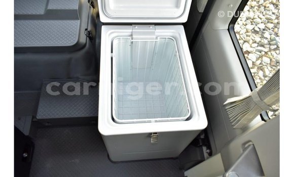 Sayi Imported Toyota Coaster White Mota in Import - Dubai a Agadez Sayi Imported Toyota Coaster White Mota in Import - Dubai a Agadez