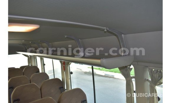 Sayi Imported Toyota Coaster White Mota in Import - Dubai a Agadez Sayi Imported Toyota Coaster White Mota in Import - Dubai a Agadez