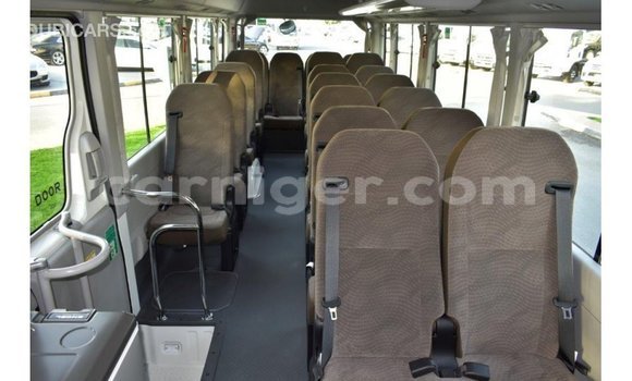 Sayi Imported Toyota Coaster White Mota in Import - Dubai a Agadez Sayi Imported Toyota Coaster White Mota in Import - Dubai a Agadez