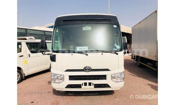 Sayi Imported Toyota Coaster White Mota in Import - Dubai a Agadez Sayi Imported Toyota Coaster White Mota in Import - Dubai a Agadez