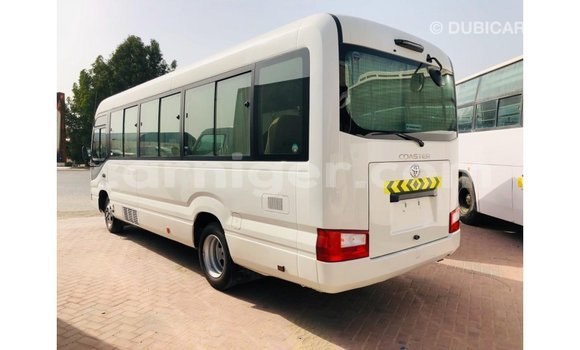 Sayi Imported Toyota Coaster White Mota in Import - Dubai a Agadez Sayi Imported Toyota Coaster White Mota in Import - Dubai a Agadez