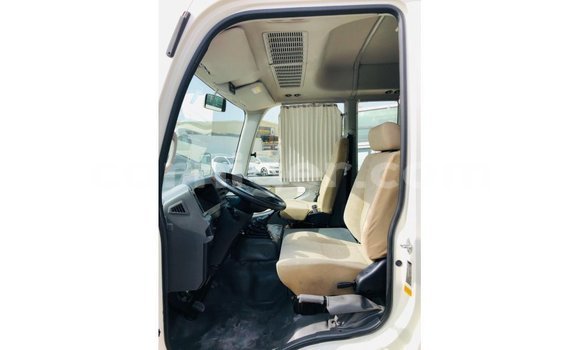 Sayi Imported Toyota Coaster White Mota in Import - Dubai a Agadez Sayi Imported Toyota Coaster White Mota in Import - Dubai a Agadez