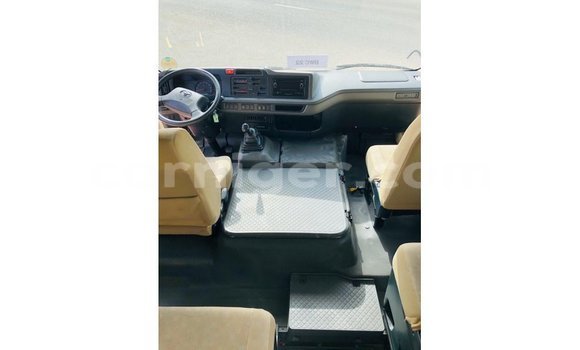 Sayi Imported Toyota Coaster White Mota in Import - Dubai a Agadez Sayi Imported Toyota Coaster White Mota in Import - Dubai a Agadez