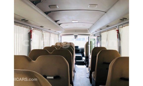 Sayi Imported Toyota Coaster White Mota in Import - Dubai a Agadez Sayi Imported Toyota Coaster White Mota in Import - Dubai a Agadez