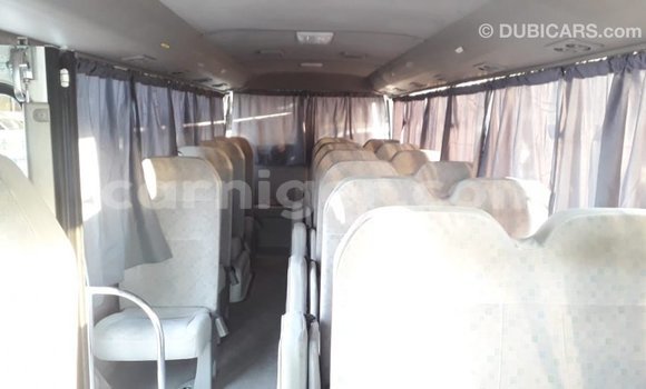 Sayi Imported Toyota Coaster White Mota in Import - Dubai a Agadez Sayi Imported Toyota Coaster White Mota in Import - Dubai a Agadez