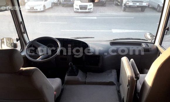 Sayi Imported Toyota Coaster White Mota in Import - Dubai a Agadez Sayi Imported Toyota Coaster White Mota in Import - Dubai a Agadez