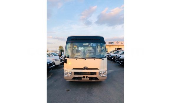 Sayi Imported Toyota Coaster White Mota in Import - Dubai a Agadez Sayi Imported Toyota Coaster White Mota in Import - Dubai a Agadez
