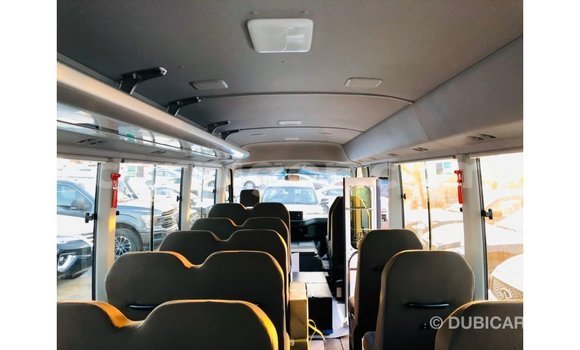Sayi Imported Toyota Coaster White Mota in Import - Dubai a Agadez Sayi Imported Toyota Coaster White Mota in Import - Dubai a Agadez