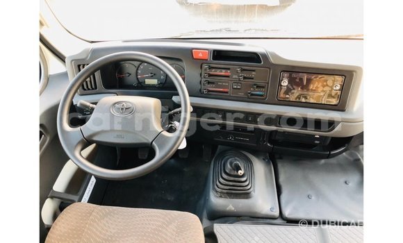 Sayi Imported Toyota Coaster White Mota in Import - Dubai a Agadez Sayi Imported Toyota Coaster White Mota in Import - Dubai a Agadez