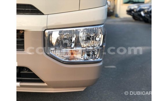 Sayi Imported Toyota Coaster White Mota in Import - Dubai a Agadez Sayi Imported Toyota Coaster White Mota in Import - Dubai a Agadez