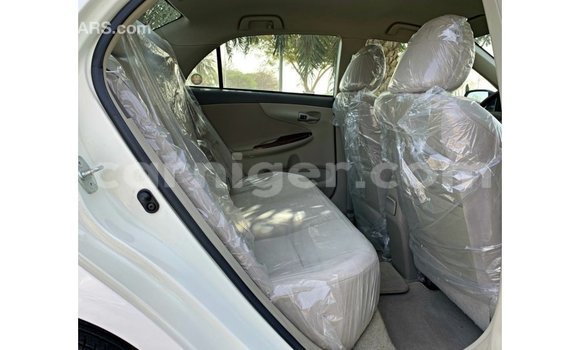 Sayi Imported Toyota Corolla White Mota in Import - Dubai a Agadez Sayi Imported Toyota Corolla White Mota in Import - Dubai a Agadez