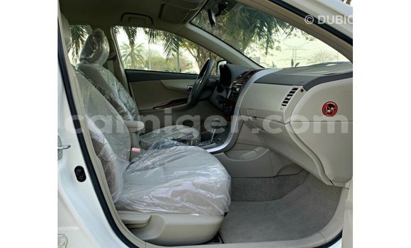 Sayi Imported Toyota Corolla White Mota in Import - Dubai a Agadez Sayi Imported Toyota Corolla White Mota in Import - Dubai a Agadez
