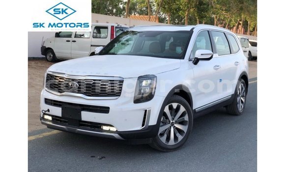 Sayi Imported Kia Carens White Mota in Import - Dubai a Agadez Sayi Imported Kia Carens White Mota in Import - Dubai a Agadez