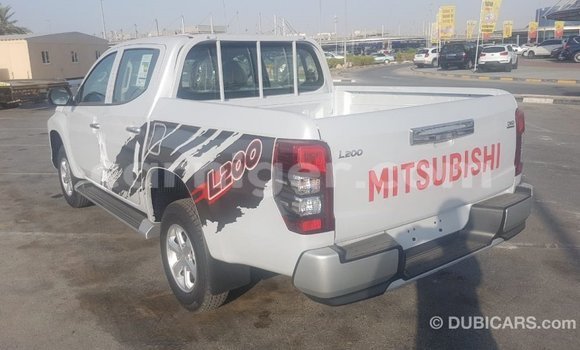 Buy Import Mitsubishi L200 White Car in Import - Dubai in Agadez Buy Import Mitsubishi L200 White Car in Import - Dubai in Agadez