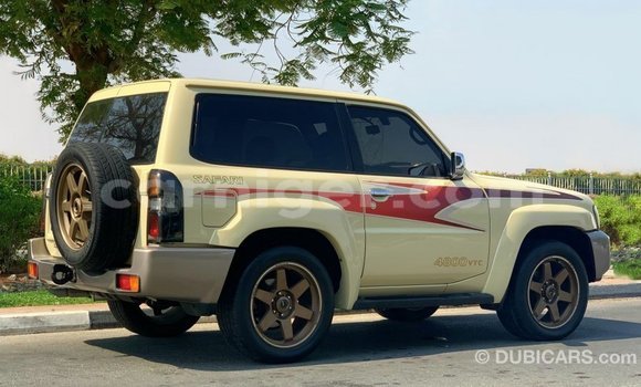 Sayi Imported Nissan Patrol Beige Mota in Import - Dubai a Agadez Sayi Imported Nissan Patrol Beige Mota in Import - Dubai a Agadez